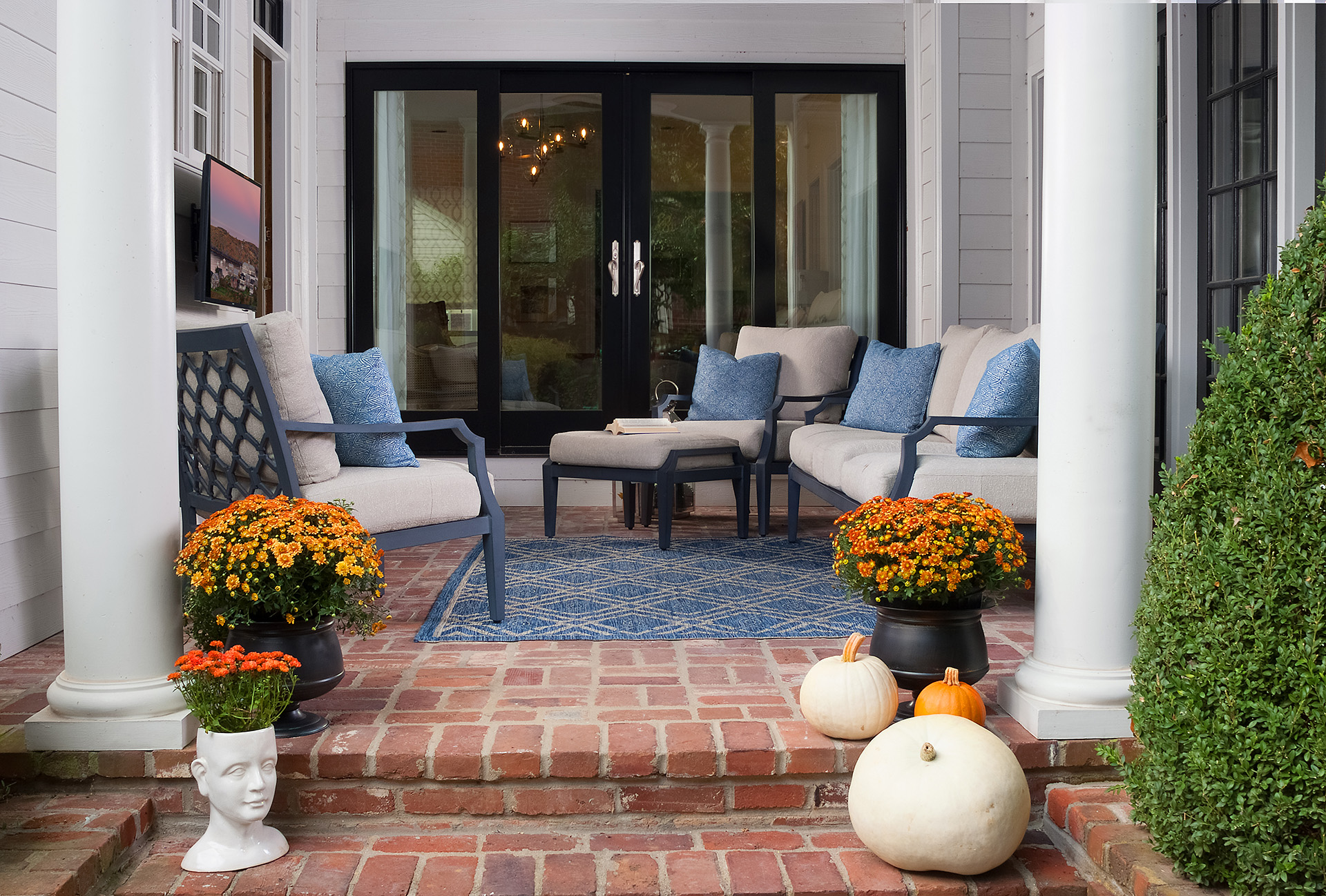 Add Pumpkins To Your Entryway To Create A Fall-Friendly Exterior